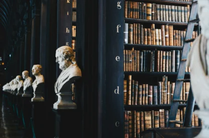 Historic law library with marble busts and old legal books symbolizing tradition and cybersecurity awareness in law firms.