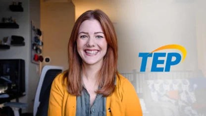 Smiling Tucson Electric Power employee featured in a cybersecurity awareness case study