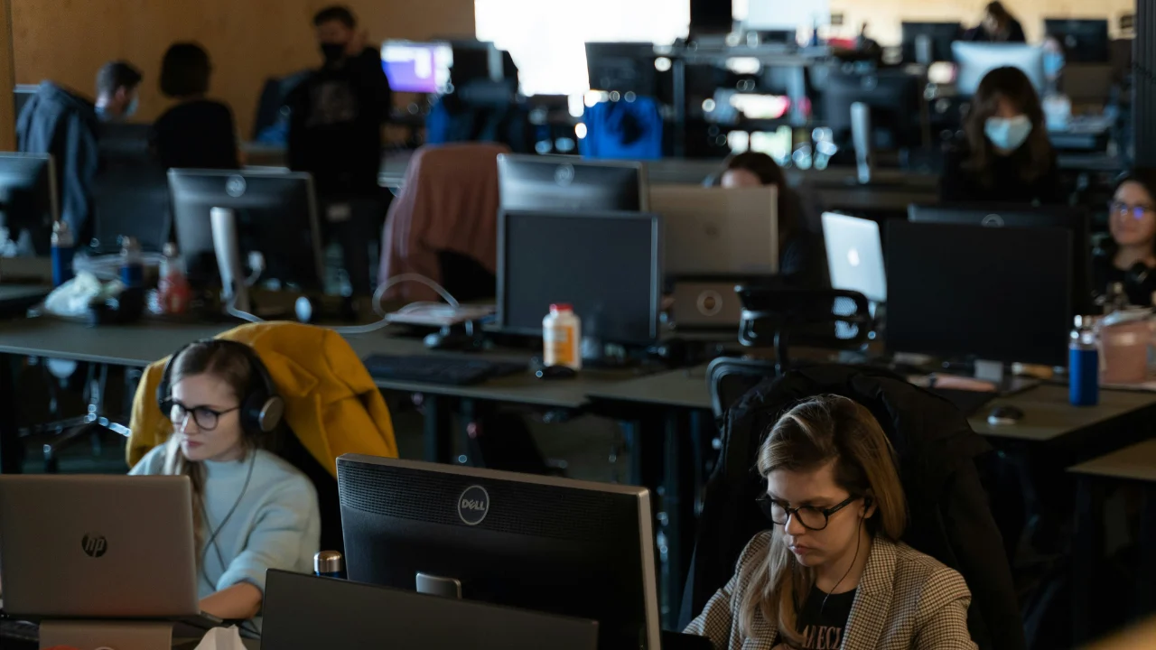 employees working in open office